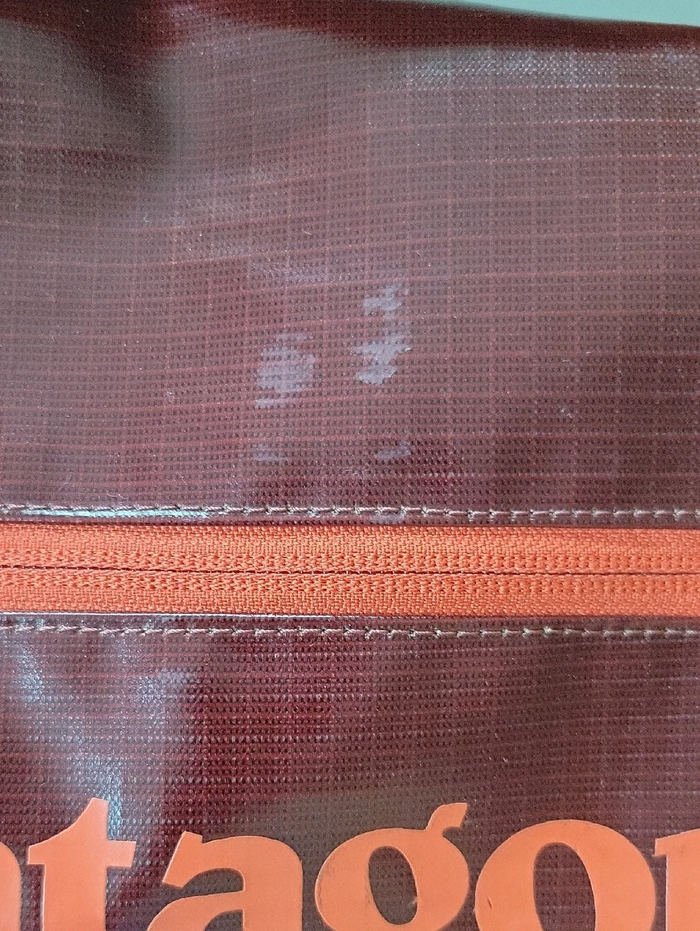 Patagonia Black Hole Mini Messenger 12L Bag Burgundy Rust with Orange Accents